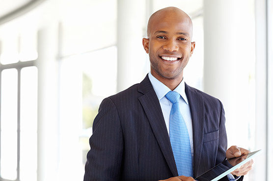 stock-photo-18207476-businessman-with-a-tablet-computer